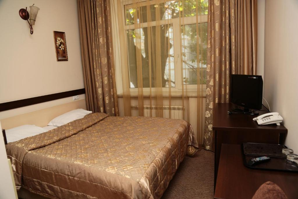 Salem On Tulebaeva Street Hotel Алма Ата Стая снимка